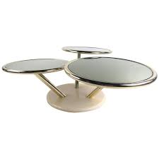 Will add contemporary style to your living room. Unique Mid Century Brass And Glass Swivel Top Coffee Table For Sale At 1stdibs