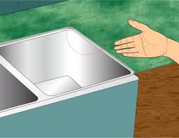 how to caulk the kitchen sink caulk