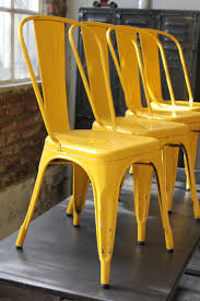 Une belle chaise dans le style tolix en métal embouti et galvanisé de couleur cuivre. 4 Ancienne Chaise Tolix Xavier Pauchard Jaune Des Annees 50