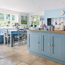 This boston kitchen sure epitomizes the perfect example of a country home. Farmhouse Kitchen With Blue Cabinetry Decorating Ideal Home Country Kitchen Designs Blue Country Kitchen Country Kitchen