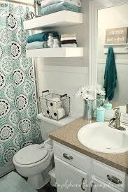 Domino featured this gorgeous mud cloth wallpaper in black and white. Top Your Toilet With A High Sided Basket To Use For Extra Storage Whether It S Toilet Paper Towels Soap Or Something Else Small Bathroom Decor Diy Small Apartment Bathroom Decor