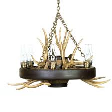 This chandelier is made from large 6 point elk antlers with mule deer antlers added. Antler Chandeliers Deer Moose Elk Lighting Cast Horn Designs
