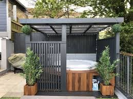 Hot tub enclosures are made of wood, metal, plastic and glass. Hot Tub Landscaping Ideas 27 Inspiring Diy Ideas For Your Backyard