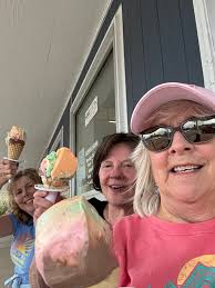 Beach buddies for ever- 1975 graduates Margie Hermansen Williams ,  Kathy(Mitzie ) Thullen Osial and Lisa Kennedy Radville . Rainbow cones in  New Buffalo and walking the beach looking for beach glass .
