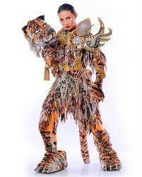 Ayuma sendiri muncul dalam balutan kostum bertajuk 'komodo dragon: Who Will Win Best In National Costume Award For Puteri Indonesia 2020