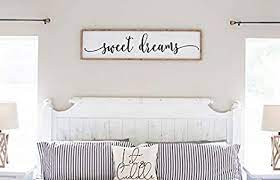 In the master bedroom of a central park apartment, the walls have a custom textured finish by atelier premiere. Amazon Com Flowershave357 Sweet Dreams Bedroom Sign Farmhouse Wood Sign Master Bedroom Above Bed Wall Decor Guest Bedroom Framed Wall Art Home Kitchen