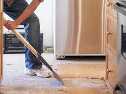 Begin with a large format run mosaic tiles from the base of the cabinets out approximately 12 into the rest of the kitchen floor. Flooring Or Cabinets Which To Install First