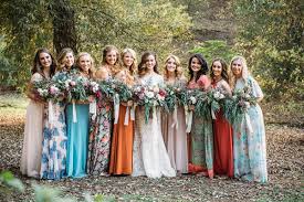 Mismatched Bridesmaid Dresses Photo By Cara Robbins Photography Http Ruffledblog Floral Bridesmaid Dresses Mismatched Bridesmaid Dresses Treehouse Wedding