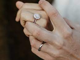 As far as how to stack them, tradition holds that you'll wear the wedding band inside the engagement ring so that it's closer to your heart (aww). Alternative Ways To Wear Your Engagement Ring And Wedding Band