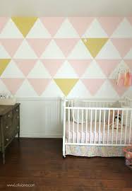 Looking to add a wallpaper accent wall to your home? Painted Triangle Accent Wall Tutorial An Easy Wall Of Art Lolly Jane