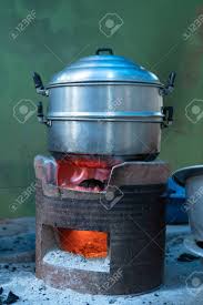 Pot retention safety grips cast iron drip pan insulated body Antique Steamer On Charcoal Stove In Old Kitchen Stock Photo Picture And Royalty Free Image Image 140777161