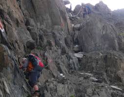 Ansicht vom pitztaler jöchl mit drei alpinisten, darunter eine frau. Alpenuberquerung Garmisch Gardasee
