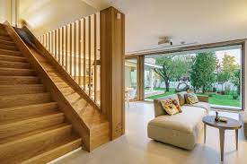 A Built In Slide Makes The Wood Stairs In This House Fun For Kids House Stairs Stairs Design Modern Family House