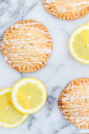 Don T These Lemon Curd Hand Pies Look Cute And Fun To Eat You Will Love The Flaky Crust Tangy Lemon Curd Filling Drizzled With A P Hand Pies Lemon Curd Curd