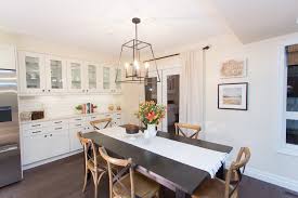 The kitchen itself is nothing short of spectacular with white cabinetry, marble countertops, pot rack and rich wood flooring. 20 Modern White Kitchens Packed With Personality