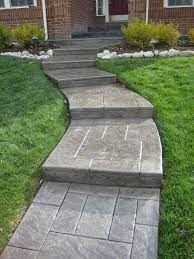This article teaches you how to prepare for and pour a concrete walkway or sidewalk. Curved Stamped Front Steps Patio Front Yard Walkway Concrete Front Steps Stamped Concrete Patio