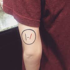 The tattoo is the logo of marcus rashford and the m and r represent his name. Twenty One Pilots Logo Tattoo Tattoos Pilot Tattoo Twenty One Pilots Tattoo