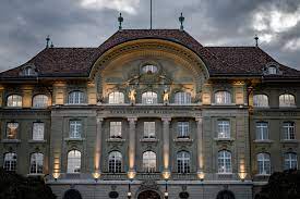 Swiss central bank reports record quarterly losses. Swiss National Bank Keeps Expansive Policy On Hold