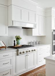 A True Balance Between Traditional And Modern Design Can Be Tricky This Complex Endeavor Requires White Modern Kitchen Kitchen Soffit White Kitchen Appliances