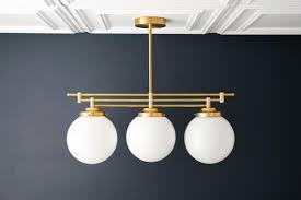 Globe Chandelier White Globe Art Deco Light Gold Brass Etsy In 2020 Art Deco Lighting Globe Chandelier White Chandelier