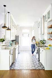 Some galley kitchens have been remodeled to remove a wall and create a bar area with seating on one side of the kitchen. Galley Kitchen Remodel Ideas Small Galley Kitchen Design Makeovers And Plans Kitchen Design Small Kitchen Layout Kitchen Designs Layout