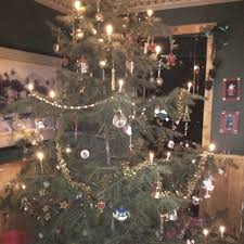 Candle Lit Christmas Tree As The Swiss Do Christmas Tree Simple Christmas Christmas Tree Lighting