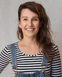 Let's introduce our cast! Lizzie Moore. As Vice-President Sam Sheedy, she's  got the critical job of keeping the President in check, along with  organising all the Exec meetings. And we all know