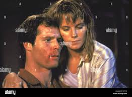 Jul 29, 1988; Pittsburgh, PA, USA; Actor JASON BEGHE stars as Allan Mann  and KATE MCNEIL as Melanie Parker in the George A. Romero directed  thriller, 'Monkey Shines.' Stock Photo
