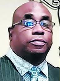 Minister Elwood Junior Jr.