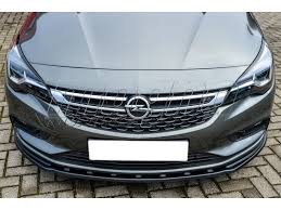 Here we see brand new black astra k with tinted glasses, on wheels with gold centers and polished rims. Opel Astra K Intenso Frontansatz