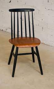 Vendu pour commander ces chaises cliquez ici. Fanett Model Vintage Chair Finnish Designer Ilmari Tapiovaara Two Tone Black Honey Teak