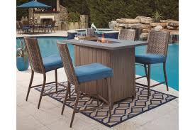 If your outdoor bar tables are counter height (shorter than standard height), consider outdoor seating with heights between 23 and 28. Partanna 5 Piece Outdoor Bar Table Set Ashley Furniture Homestore