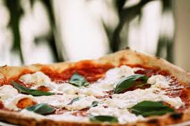 (romaine, tomatoes, red onions, fresh mozzarella, parmesan, mushrooms tossed in olive oil & balsamic vinaigrette). Rossovivo Artisan Pizza Exquisite Food Delivered