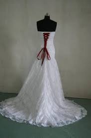 White Lace Wedding Gown With Apple Red Corset Lace Ups Red Wedding Dresses Making A Wedding Dress Wedding Dresses