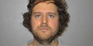 Driver charged after video shows him pushing through pack of bicyclists in  Irondale