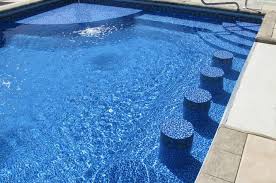 Swimming Pool With Built In Barstools And A Merlin Liner Www Merlinindustries Com Swimming Pool Safety Building A Pool Swimming Pools