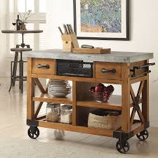 Since it's usually a larger unit, it can offer both storage and prep space, as well as an integrated dining area. Faiyaz Kitchen Cart Reviews Birch Lane