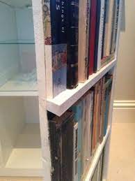 The alpha door's specific design conceals the small spaces normal and standard bookcase doors need to operate. Fake Bookcase Hides Secret Cabinet Ikea Hackers Bookcase Ikea Hack Ideas Diy Furniture