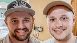 Josiah Duggar and Joseph Duggar pop up in wedding photos