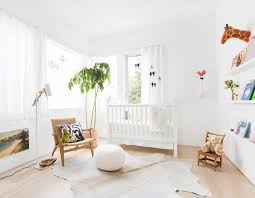 Ample amount of storage for children's clothing is incorporated through dresser and space underneath the beds. 16 Minimalist Modern Kids Room Designs That Are Anything But Bare