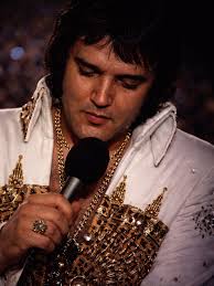 Elvis - By 1977, the world could see that Elvis Presley was no longer the  young man who once set stages on fire with effortless ease. His body was  heavier, his eyes