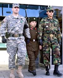 Repatriated North Korean soldier walking in between an American (1st  Infantry Division) and a South Korean soldier while exiting the  Inter-Korean House of Freedom in Panmunjom. 2006 [1800×2251] :  rMilitaryPorn