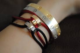 Cartier Love Charity Bracelet White Gold With Black Cord Love Charity Bracelet Pink Gold With Red Cord Love Bracelets Cartier Love Bracelet Charity Bracelet