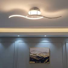 In a dining room, a beautiful chandelier will create a sense of class and formality, even if the furniture in the space isn't exactly formal. Curve Led Ceiling Light In 2021 Led Ceiling Lights Ceiling Lights Led Chandelier