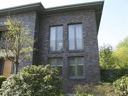 Dunkle Klinker Fur Eine Zeitlose Architektur Architektur Klinker Anbau Haus