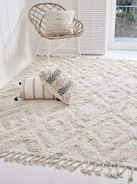 Made from super soft cotton in a sumptuous ecru colour, our elegant contrast tasselled bedside rug will complement any interior style. New Sula Bedside Rug Runner Rugs Luxury Rugs Soft Furnishings Rugs In Living Room Room Rugs Living Room Carpet