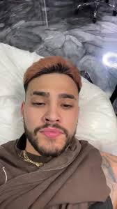 Stylish Gothic Tattoo of 'Susana' in Tattoo Parlor