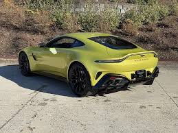 Image result for Yellow Tang 2020 Aston Martin
