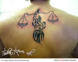 The libra scale may be an unusual subject for tats but there are a lot of tattoo enthusiasts that are intrigued and fascinated by it. Libra Tattoo Unique Libra Symbol Tattoos Back Tattoos For Guys Tattoos For Guys Zodiac Tattoos