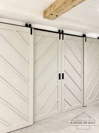 Do you love the look of a barndoor inside a house but not the expensive price tag? How To Build Bypass Barn Doors